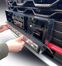 NUMBER PLATE MOUNTED DRIVING LIGHT